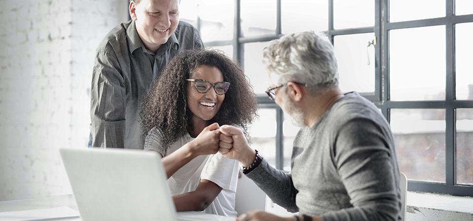 Three entrepreneurs happy to learn about building their own b2b matchmaking platform without writing a single line of code