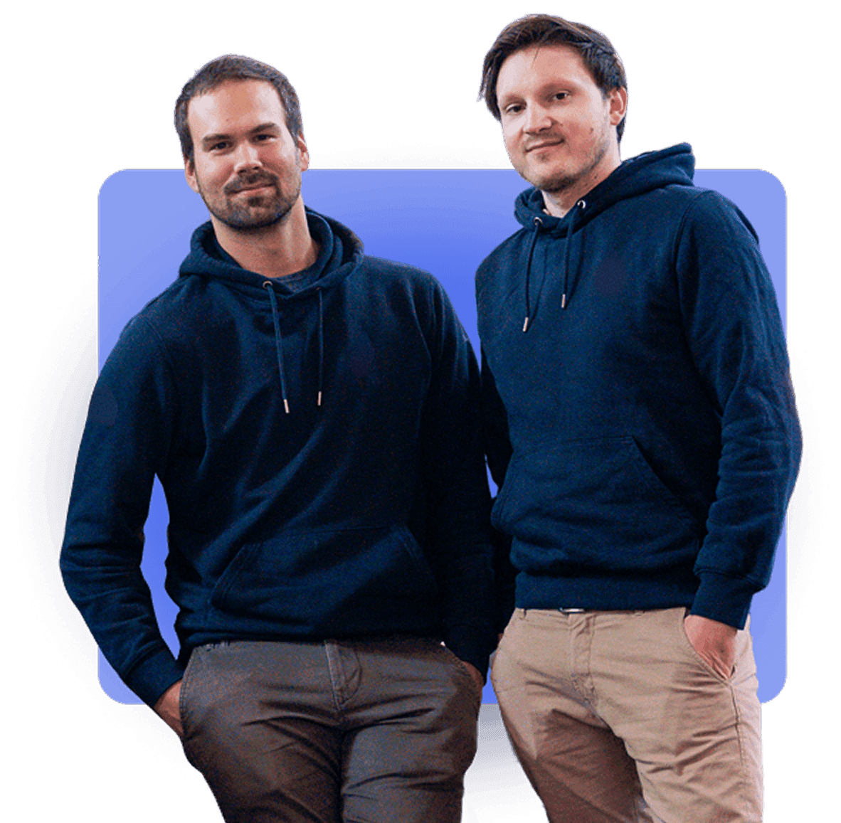 Innoloft co-founders Sven Pietsch and Christopher Stirner posing in casual hoodies against a blue background.